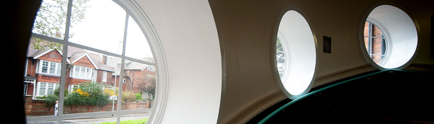 A photo of the round windows in the Main Building 